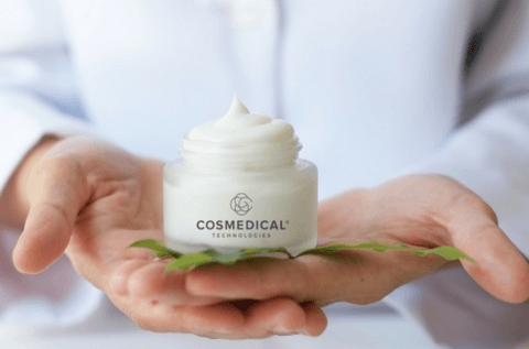 doctor holding skin cream